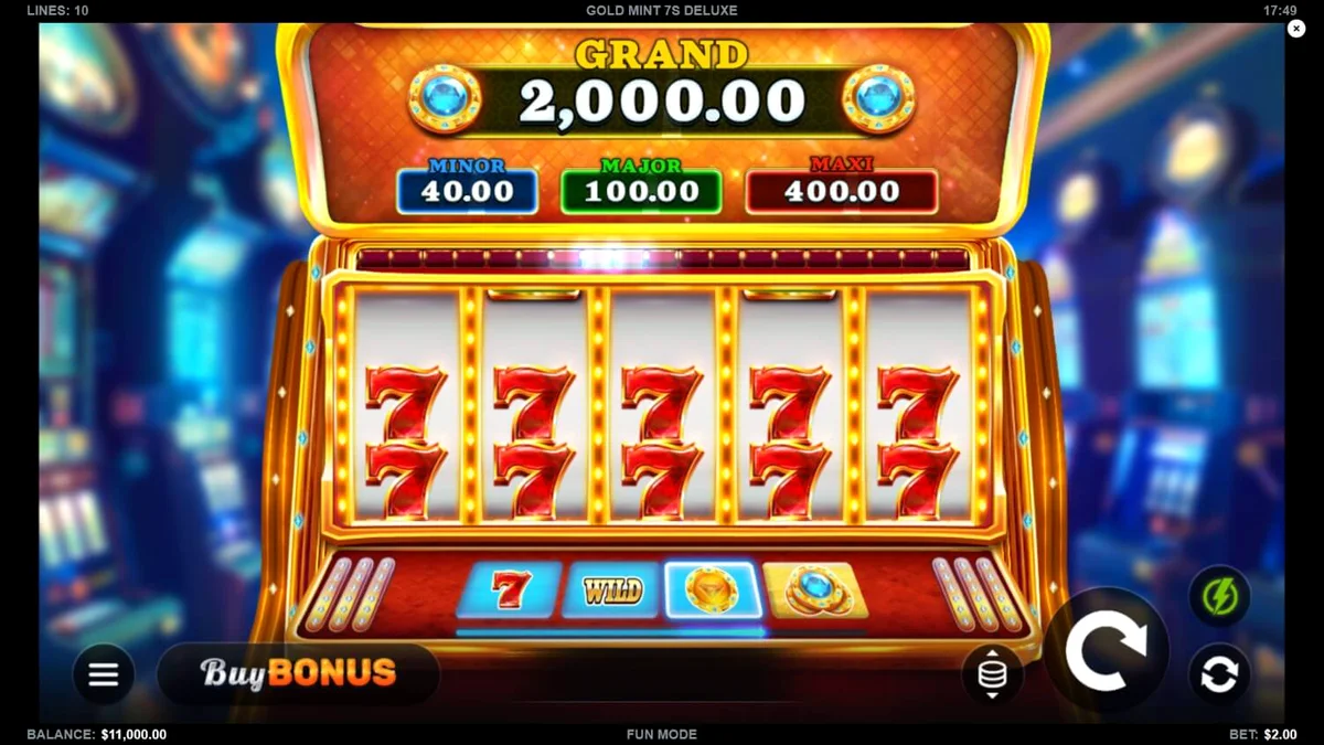 Gold Mint 7s Deluxe slot machine interface na may gintong tema